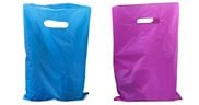 Carry bags with die cut handle
